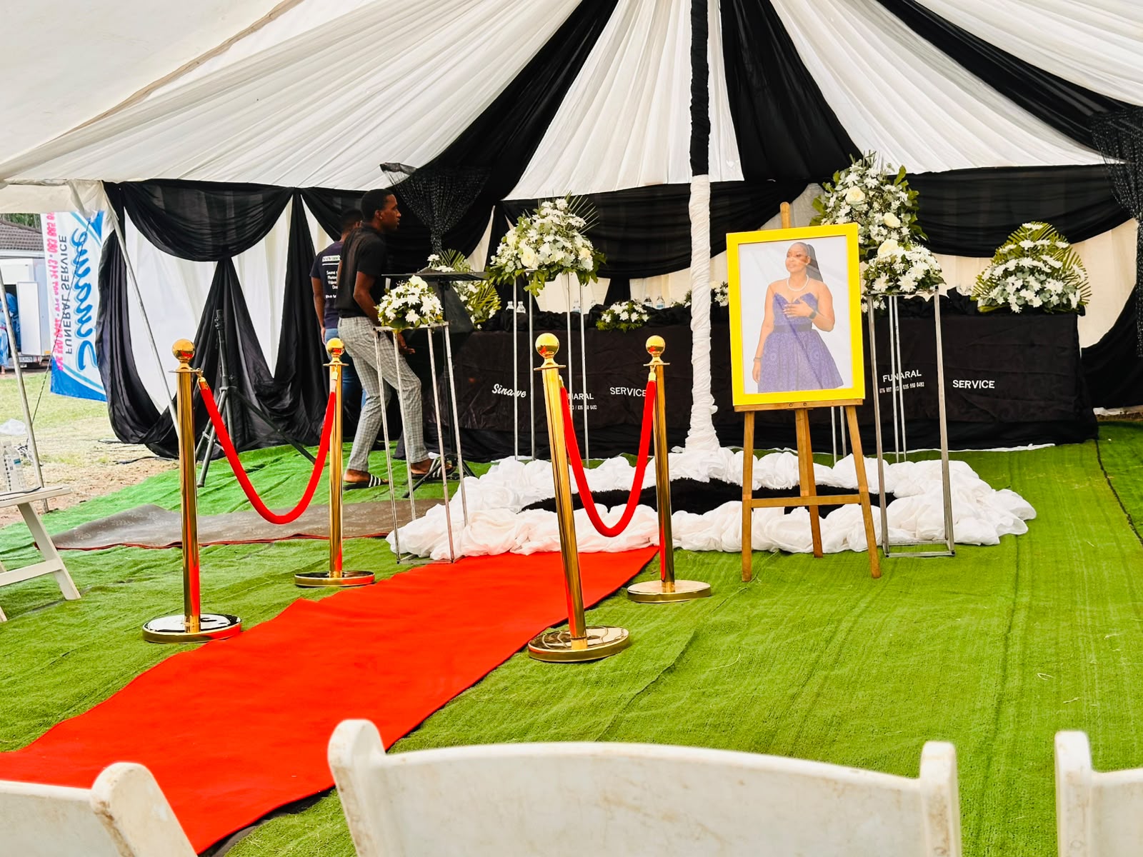 Elegant black and white draping with red carpet entrance